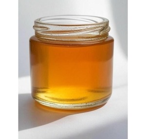 Fournisseur indien de miel de Tulsi naturel pour les boissons, le petit-déjeuner, les desserts ou les besoins de cuisine, disponible au meilleur prix - Product Image 1