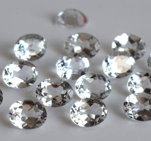 บุษราคัมสีขาวธรรมชาติทรงวงรีตัดขนาด7x9มม. เป็นรูปวงรีหลวมสีขาวบุษราคัม - Product Image 1