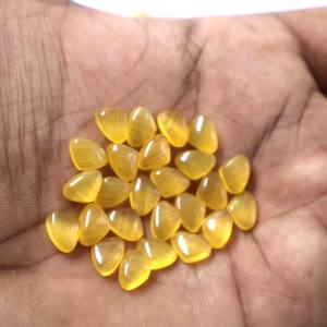 Vente en gros de 20mm cristal de Monalisa naturel jaune ovale coupe collier de pierres de guérison sculpté à la main artisanat de pierres précieuses fantaisie en vrac - Product Image 1