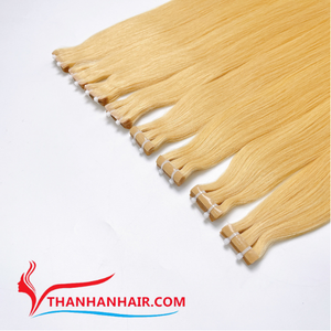 ราคาโรงงาน ผมต่อแบบเทป Remy สีบลอนด์ตรงธรรมชาติ เกรดพรีเมียม คุณภาพสูงสุด ผมแท้เวียดนาม ไม่พันกัน ขนาดใหญ่ - Product Image 1