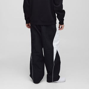 กางเกงผู้ชายผ้าไนลอนระบายอากาศได้ดีมี100% Oem/odm ซักได้ตามต้องการแฟชั่นผ้ากันลมพร้อมกางเกงด้านข้าง - Product Image 2