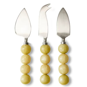 Vente flash sur un ensemble de coupe-fromage de haute qualité en acier inoxydable fait à la main avec des perles en résine de couleur crème et une poignée plaquée or - Product Image 1