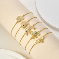 Bracciali a catena Bolo regolabili in ottone placcato oro 18 carati con ciondoli a forma di elefante portafortuna con pavé di zirconi, all'ingrosso