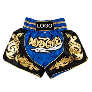 กางเกงขาสั้นกีฬา MMA แบบผูกเชือกโพลีเอสเตอร์พิมพ์ลายสำหรับทั้งชายและหญิงชุดชกมวยสีพื้นยืดได้ตามต้องการสำหรับผู้ใหญ่และผู้ชาย - Product Image 1