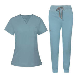 Último Diseño en Uniformes Médicos Elegantes para Mujer, Conjuntos de Uniformes de Enfermería 100% Algodón Canvas para Uso Hospitalario, Colores y Tallas Personalizables - Product Image 1