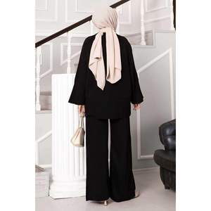 Conjunto de punto de dos piezas negro para mujer con detalle de abertura - Product Image 5