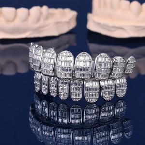 กริลล์ซฟันทองเหลืองคุณภาพเยี่ยม ผลิตจากโมอิสซาไนต์ในห้องปฏิบัติการ ชุบโรเดียม สำหรับทุกเพศทุกวัย ของขวัญสำหรับผู้ชายและผู้หญิง มีจำหน่ายจำนวนมาก - Product Image 2