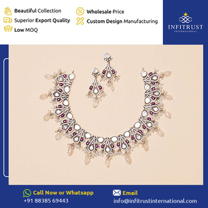 Experts dans la vente de boucles d'oreilles Polki blanches et rouges glamour de qualité supérieure avec ensemble de colliers pour femmes - Product Image 2