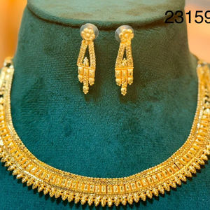 <b>24</b> <b>carat</b> Elegant <b>gold</b> necklace and earring set with Pear Shaped intricate design. - Product Image 1