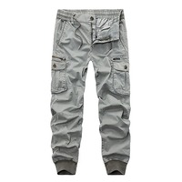 Großhandel Mid-Waist Straight Canvas Hose Streetwear Multi-Pocket Cargo-Hose mit Knopfverschluss Dunkel Unifarben 100% Baumwolle