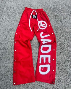 กางเกงและกางเกงของผู้ชายเสื้อกันลมผ้าไนลอนโพลีเอสเตอร์ขาบานติดกระดุมด้านข้างแบบลำลองใส่ได้ทั้งชายและชายโลโก้แบบกำหนดเอง2025 - Product Image 6