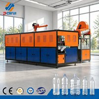 Machine de soufflage pour préformes de bouteilles PET à 4 cavités, robustes, pour huiles comestibles, certifiée ISO 9001, pour commandes en gros, d'un fabricant polyvalent