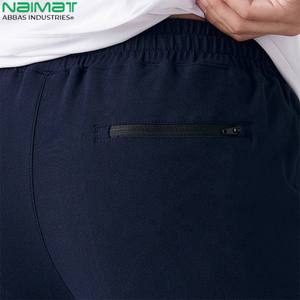 Pantalon de jogging uni doux et extensible pour hommes, décontracté, athlétique, coupe ajustée, taille élastique, poche à cordon, vente en gros de polyester et d'élasthanne - Product Image 4