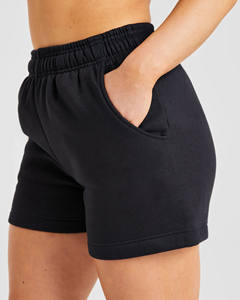 Short de survêtement taille moyenne pour femmes noir avec logo personnalisé de qualité supérieure avec poches Short de sport taille haute doux et respirant pour femmes - Product Image 6