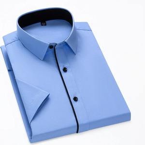 Camisa clásica de verano para hombre, camisas de vestir formales sólidas de manga corta, camisa de oficina cómoda de ajuste estándar social de negocios fácil de cuidar - Product Image 1