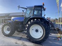 Tracteur à roues New Holland TM150 4x4 150 CV avec boîte de vitesses automatique, pompe et roulement à longue durée de vie pour usage agricole