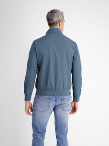 Venta al por mayor ligero impermeable a prueba de viento sin cuello chaqueta cortavientos personalizado estilo Formal logotipo frontal recubierto de procesamiento 100% - Product Image 6