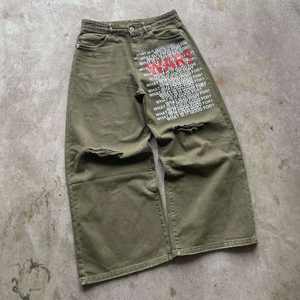 กางเกงยีนส์ทรงเอวสูงแบบวินเทจ แต่งลายพิมพ์สกรีน ขอบขาบาน ซักฟอกแบบดิสเทรส พร้อมกระดุมปิด - Product Image 2