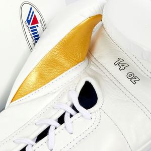 Gants de boxe en cuir de haute qualité avec logo personnalisé Gants d'entraînement de combat à lacets Style gagnant Vente en gros Arts martiaux OEM ODM - Product Image 4