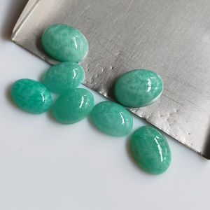 พลอยอะมาโซไนท์ทรงหลังแบนอัญมณีสีเขียวธรรมชาติเกรดสูง10X14มม. - Product Image 1