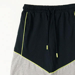 Pantalones cortos de alta calidad para hombre, malla ecológica, diseño de retazos transpirable, cintura media, cierre de cordón, Color sólido - Product Image 3