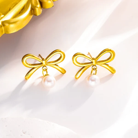 En gros Petit Tempérament Frais Noeud Papillon Perle Artificielle Boucles D'oreilles et Collier pour Femmes Bijoux De Mode Coréenne