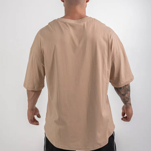 เสื้อยืดบ็อกซี่คอกลมสำหรับผู้ชายทำจากผ้าฝ้ายเนื้อนุ่มเหมาะสำหรับดีไซน์แบบกำหนดเองหรือชุดลำลองสวมใส่สบายมีสไตล์ - Product Image 2