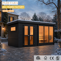 Sauna extérieur moderne PLOUTARA, cabane en bois à toit plat noir, porte en verre, grandes baies vitrées latérales, OEM Villa Resort Spa