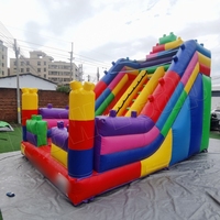 Château gonflable combiné avec toboggan et blocs de construction gonflables 6MX4M pour enfants OEM
