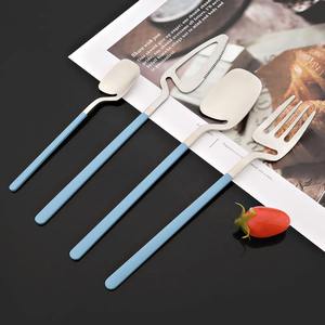 Stylish stainless steel cutlery <b>set</b> with light blue handle and modern <b>artistic</b> design for dining and dessert serving from India - Product Image 6