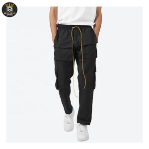 กางเกงคาร์โก้ผู้ชายทรงสตรีทแวร์ ดีไซน์ใหม่ล่าสุดปี 2025 ระบายอากาศได้ดี มีเชือกผูกและกระดุม กันน้ำ เป็นมิตรกับสิ่งแวดล้อม ขายดีจากโรงงาน - Product Image 1