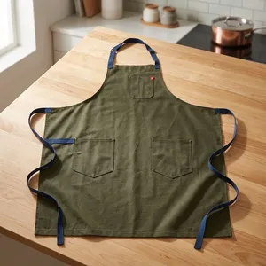 Tablier classique sans manches en toile olive verte tissée avec poches, lavable en machine, écologique, pour les produits de nettoyage et l'usage quotidien - Product Image 1