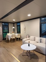 Expédition immédiate : Maison préfabriquée extensible à double aile de 10 pieds, pré-assemblée, cabine portable pour poste de garde de sécurité