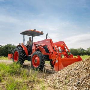 Tracteur utilitaire compact Kubota LA1055 avec chargeur frontal, direction de précision et conception à faible entretien - Product Image 1