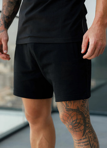 Vente en gros de shorts de gym de couleur noire en jersey pour hommes OEM avec logo personnalisé shorts d'entraînement en coton respirant et extensible fournisseur de vêtements de sport - Product Image 2