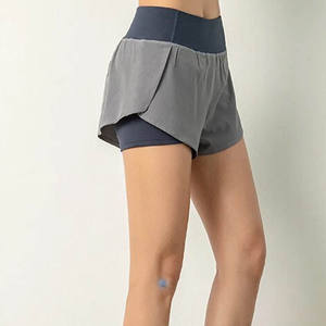 Pantalones cortos de yoga transpirables de cintura alta para mujer Venta al por mayor Pantalones cortos de entrenamiento de gimnasio sin costuras de cintura media Diseño de patrón sólido - Product Image 2