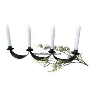 Venta al por mayor de fábrica, soporte de vela de hierro para 4 velas, duradero y elegante para decoración navideña rústica Vintage de Rana Overseas Inc - Product Image 1