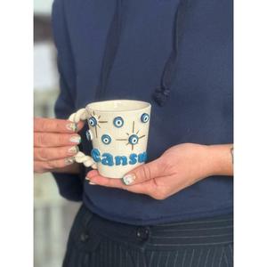 Tazza malocchio con manico a coclea - Product Image 1