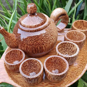 Tasse à thé vietnamienne écologique en bois de noix de coco, vaisselle naturelle et durable sculptée et polie à la main pour restaurants - Product Image 1