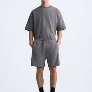 Conjunto de 2 Piezas para Hombre, Estilo Casual de Verano, Color Liso, Pantalones Cortos con Cintura Elástica y Camiseta Transpirable, 100% Algodón de Alta Calidad - Product Image 1