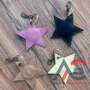 Llavero en forma de estrella de cuero colorido hecho a mano más vendido, llaveros de vaquero y vaquera de cuero genuino occidental, llavero con estampado de vaca - Product Image 1