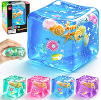 Juguete Sensorial Antiestrés Personalizado con Conchas Marinas, Caracoles, Estrellas de Mar, Purpurina, Cubo Transparente Suave para Apretar
