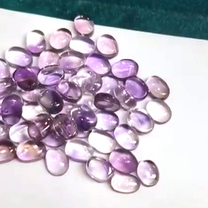 พลอยอะเมทิสต์ทรงหลังเบี้ยสีฟ้าธรรมชาติขนาด8x6มม. ถึง14x14มม. 2460ชิ้นทรงวงรีทรง5040cts - Product Image 4