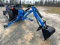 Tractor utilitario compacto New Holland Workmaster 40 35 40HP 4WD, usado y en excelentes condiciones, con transmisión shuttle y cargador frontal, listo para trabajar en la granja. - Product Image 5