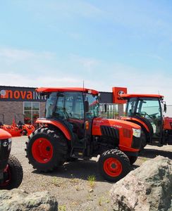 Tracteur agricole compact Kubota BX23S avec chargeur frontal. - Product Image 4