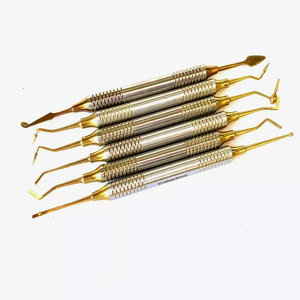 Instrument chirurgical de remplissage composite dentaire Kit de restauration enduit d'or 6 pièces - Product Image 1