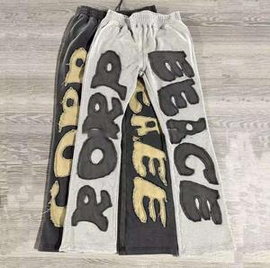 Pantalones Vintage con apliques personalizados, pantalones de pierna ancha con gráfico, parche bordado, pantalones de chándal acampanados lavados con ácido para correr apilados para hombres - Product Image 1