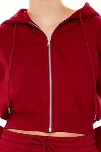 ผู้ผลิต OEM รับผลิตเสื้อฮู้ดดี้ผู้หญิงแบบสั้นสำหรับฤดูหนาว ผ้าฝ้าย 100% เนื้อนุ่ม เอวหลวม แขนยาว ซิป ฮู้ดดี้ครอปสำหรับผู้หญิง - Product Image 4