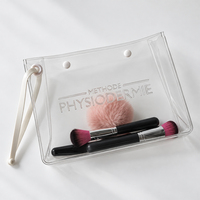 Pochette de maquillage en PVC avec logo personnalisé, ouverture supérieure, transparente, pour cosmétiques et articles de toilette, avec dragonne, pour la beauté et la promotion de cadeaux