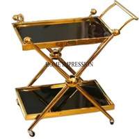 Chariot de vente chaud élégant et moderne en métal plaqué or robuste avec roues pour servir des aliments et des boissons à la maison